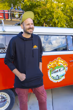 Wade, Van'N Boozy wine tour host and mechanic keeping the vintage VW buses running