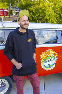 Wade, Van'N Boozy wine tour host and mechanic keeping the vintage VW buses running