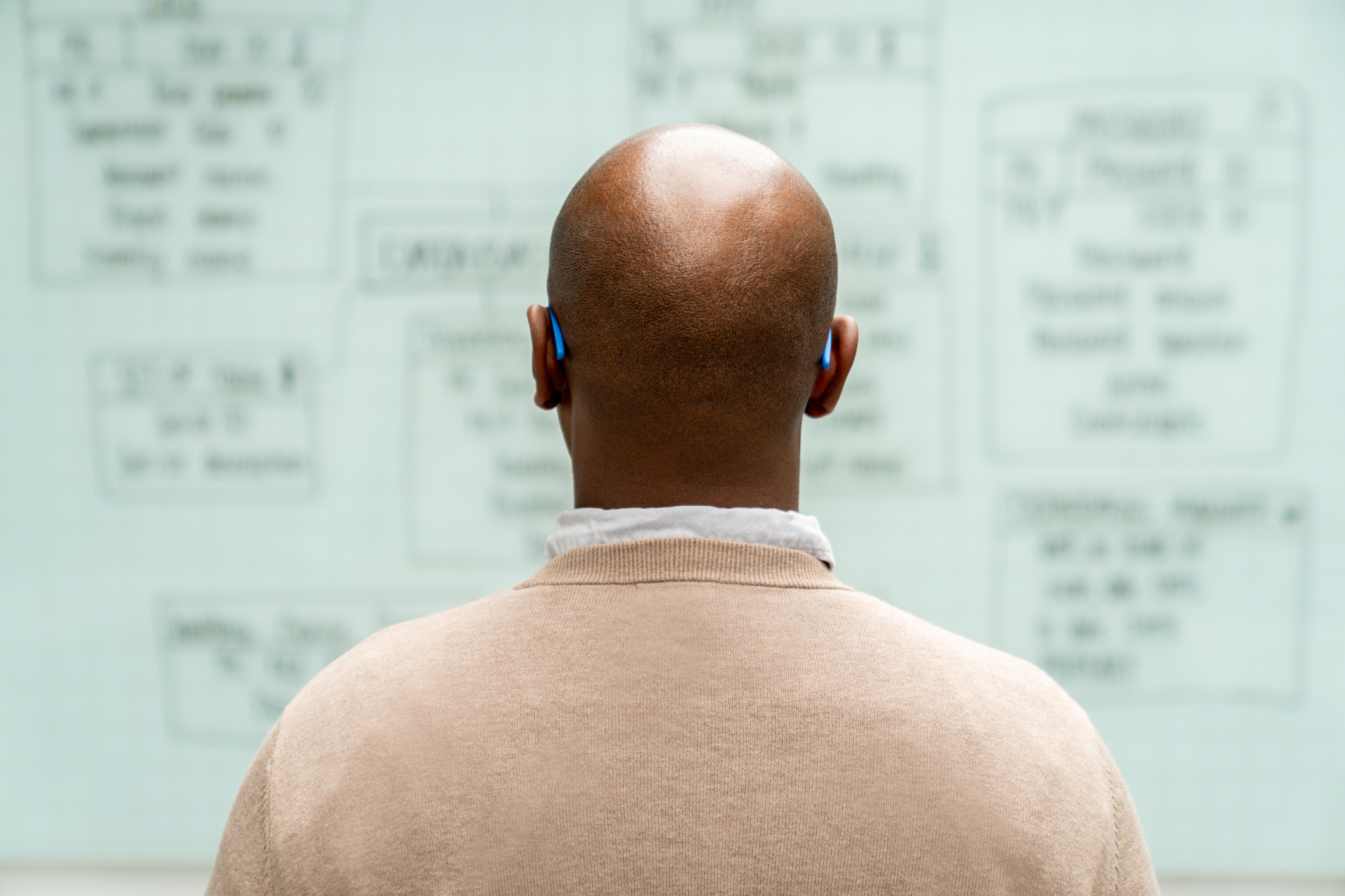 Digital Marketer Looking at Whiteboard