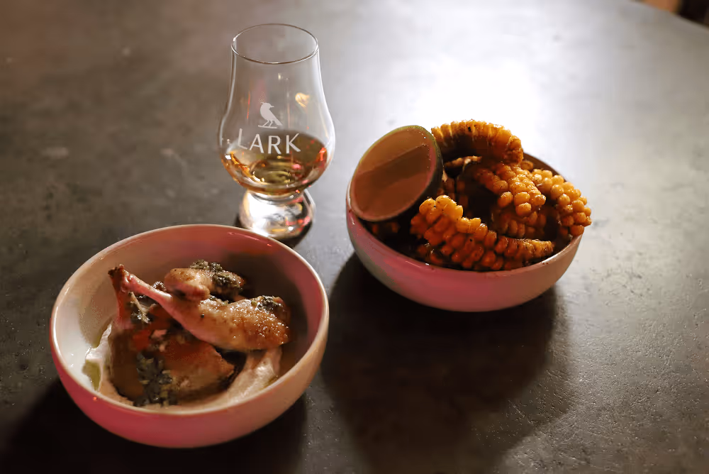 Whisky, corn ribs and quail.