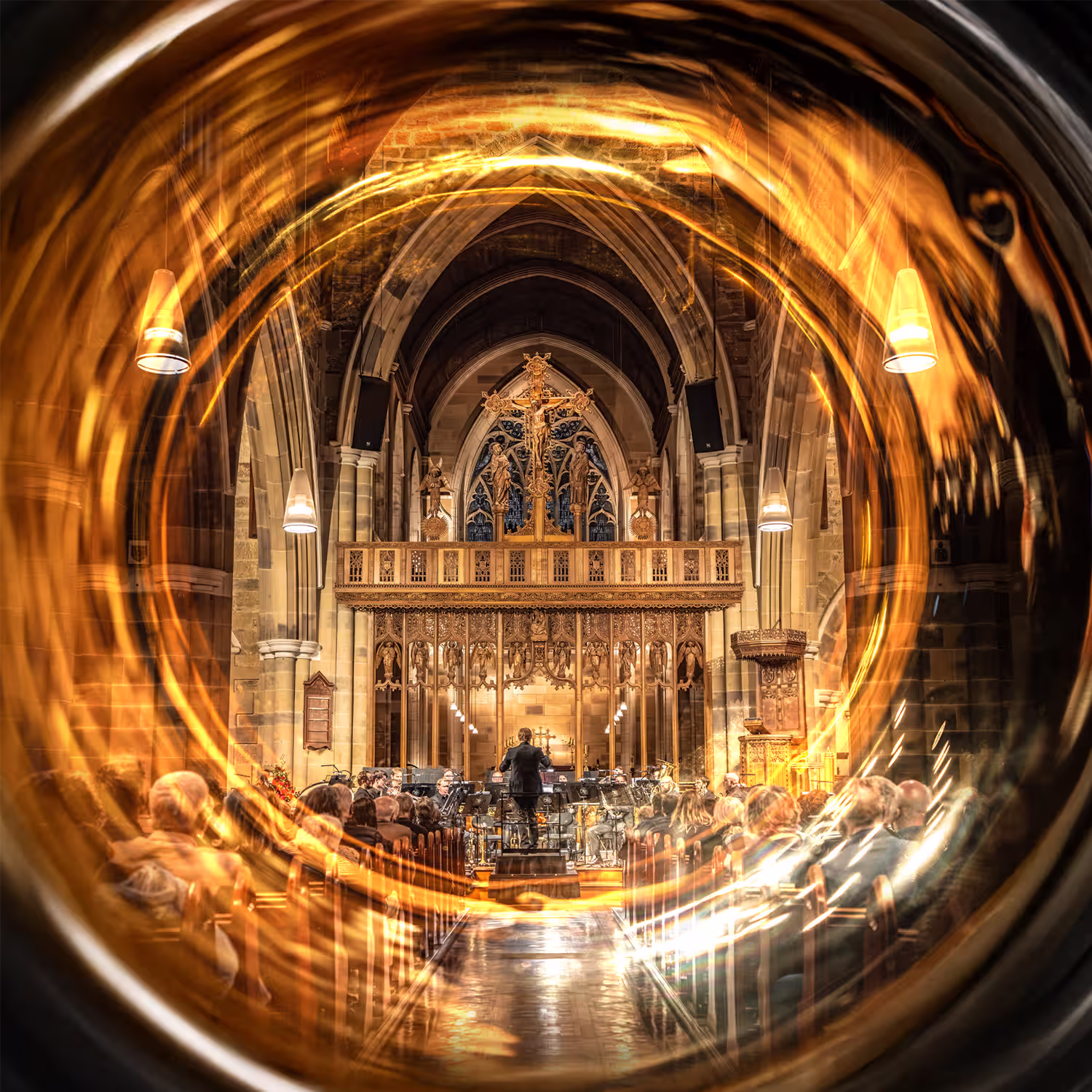 St David's Cathedral filled with musical performers and audience members.