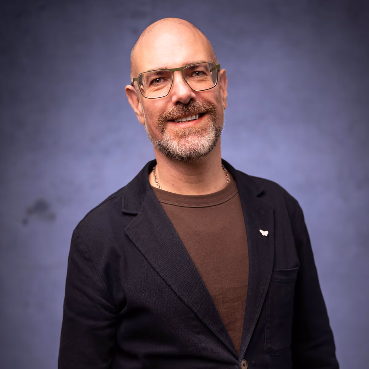 A man smiling at the camera.