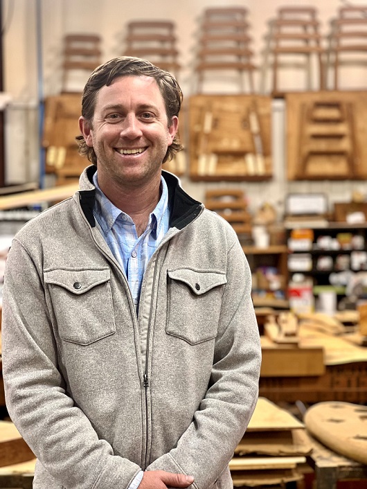 An image of Release Marine’s President Matt Hecht with their products in background.