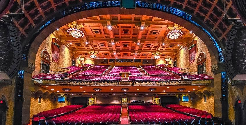 A large auditorium with rows of seats
