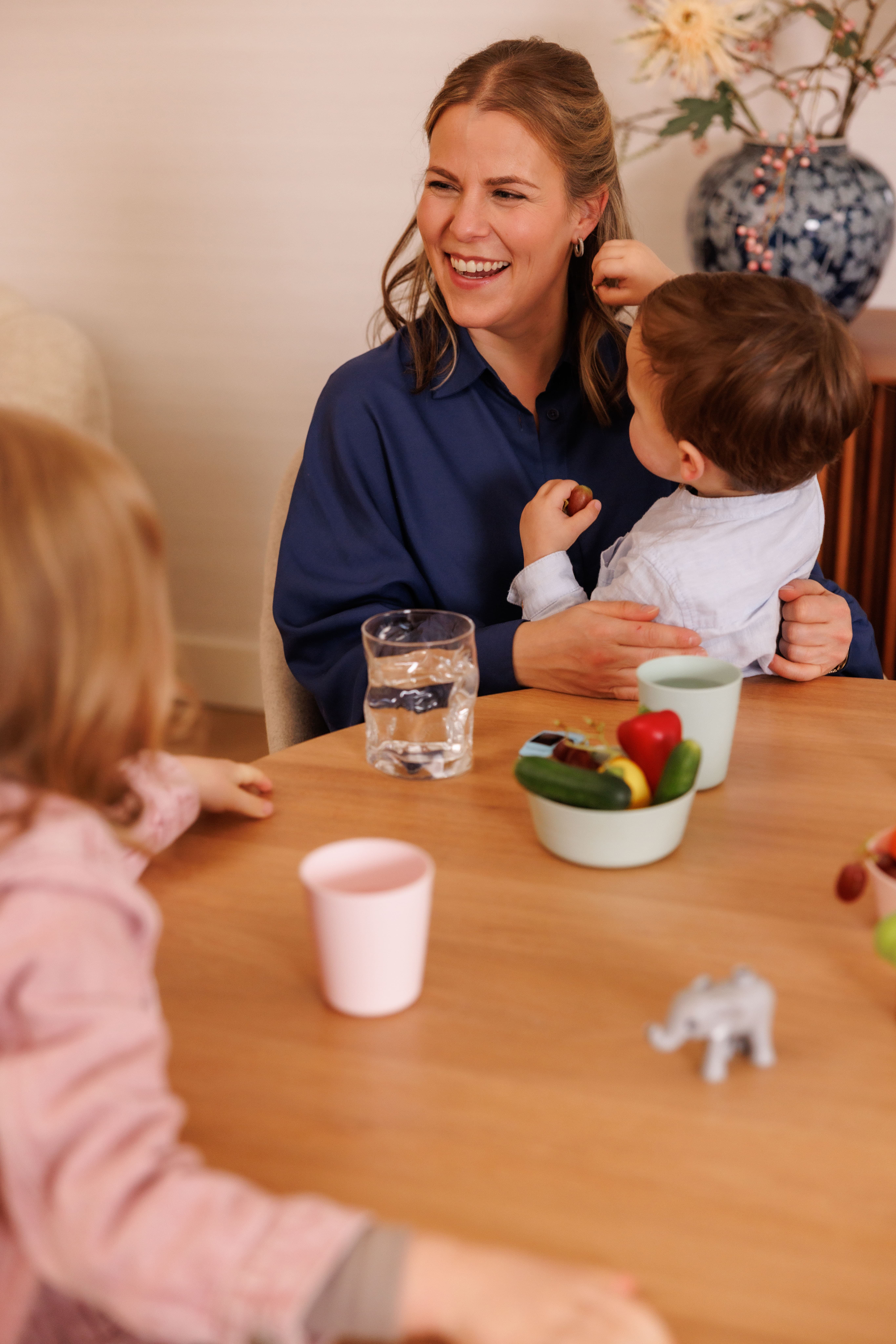 Family table scene for PeakSpring chemical-free home water and safer daily routines.