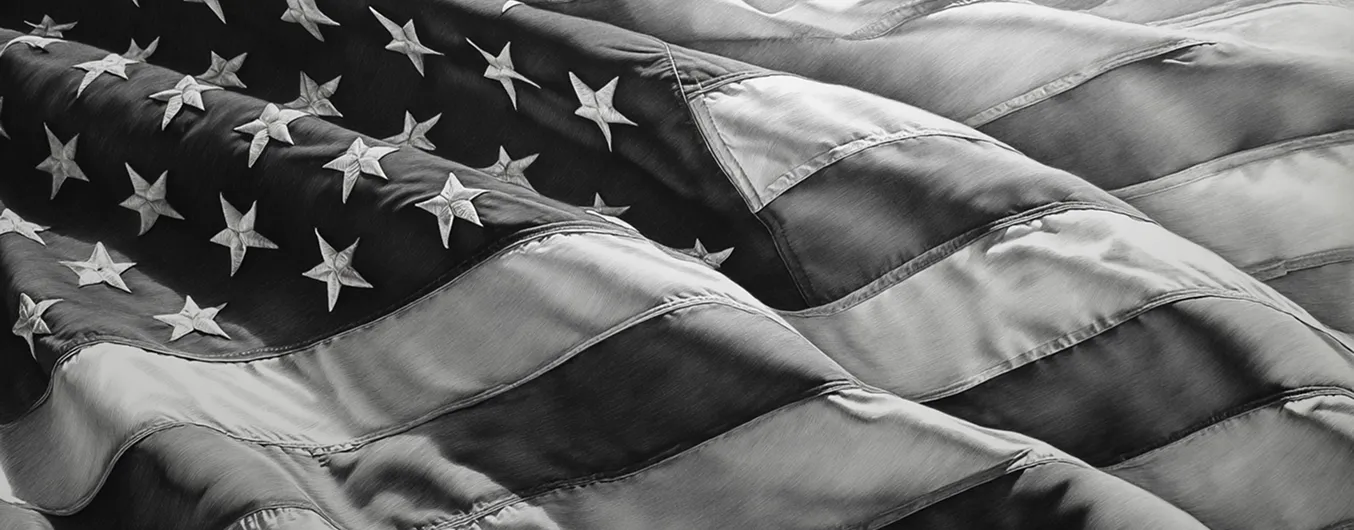 A black and white photo of an American flag.