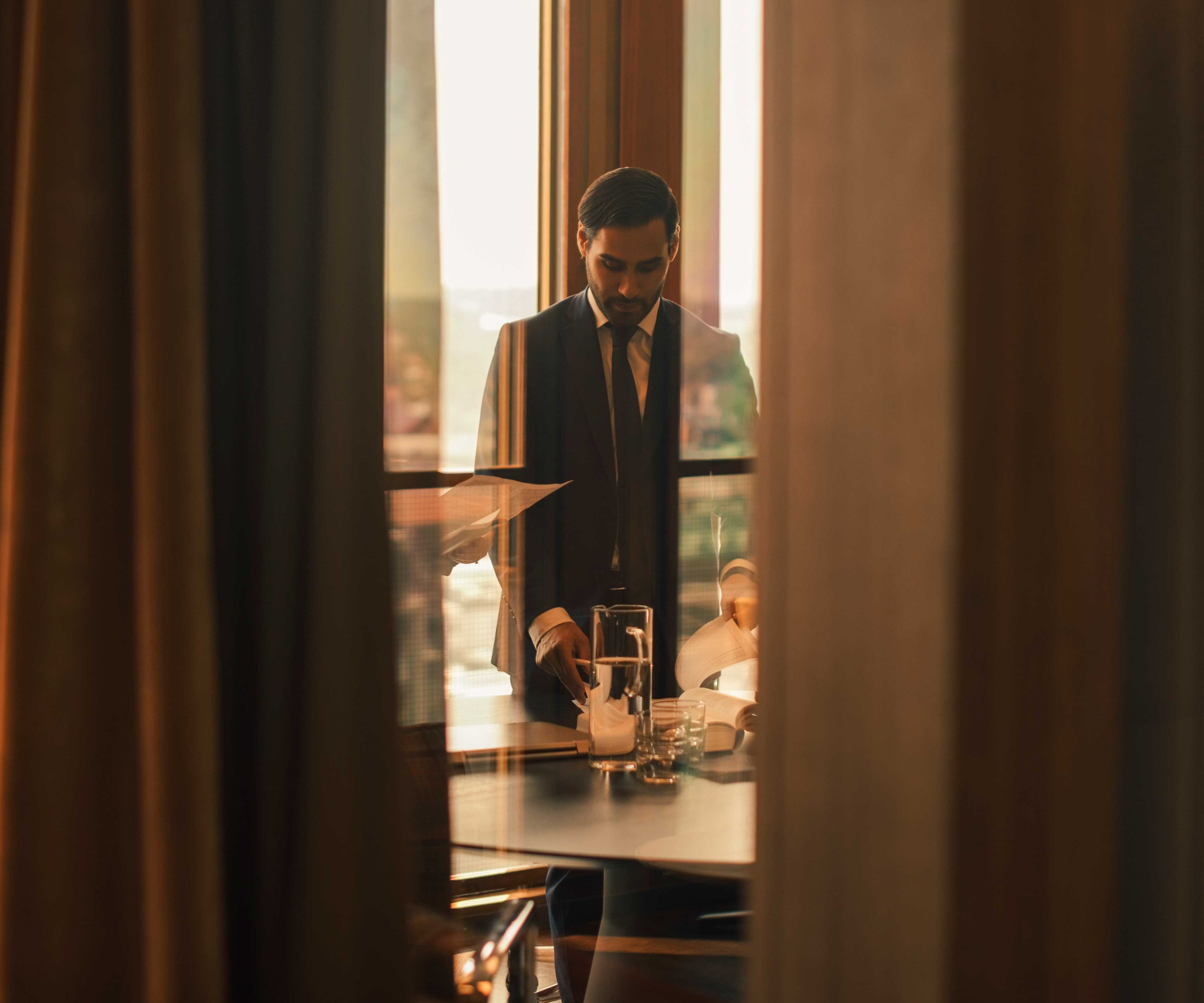 Well-dressed man in a luxury business setting