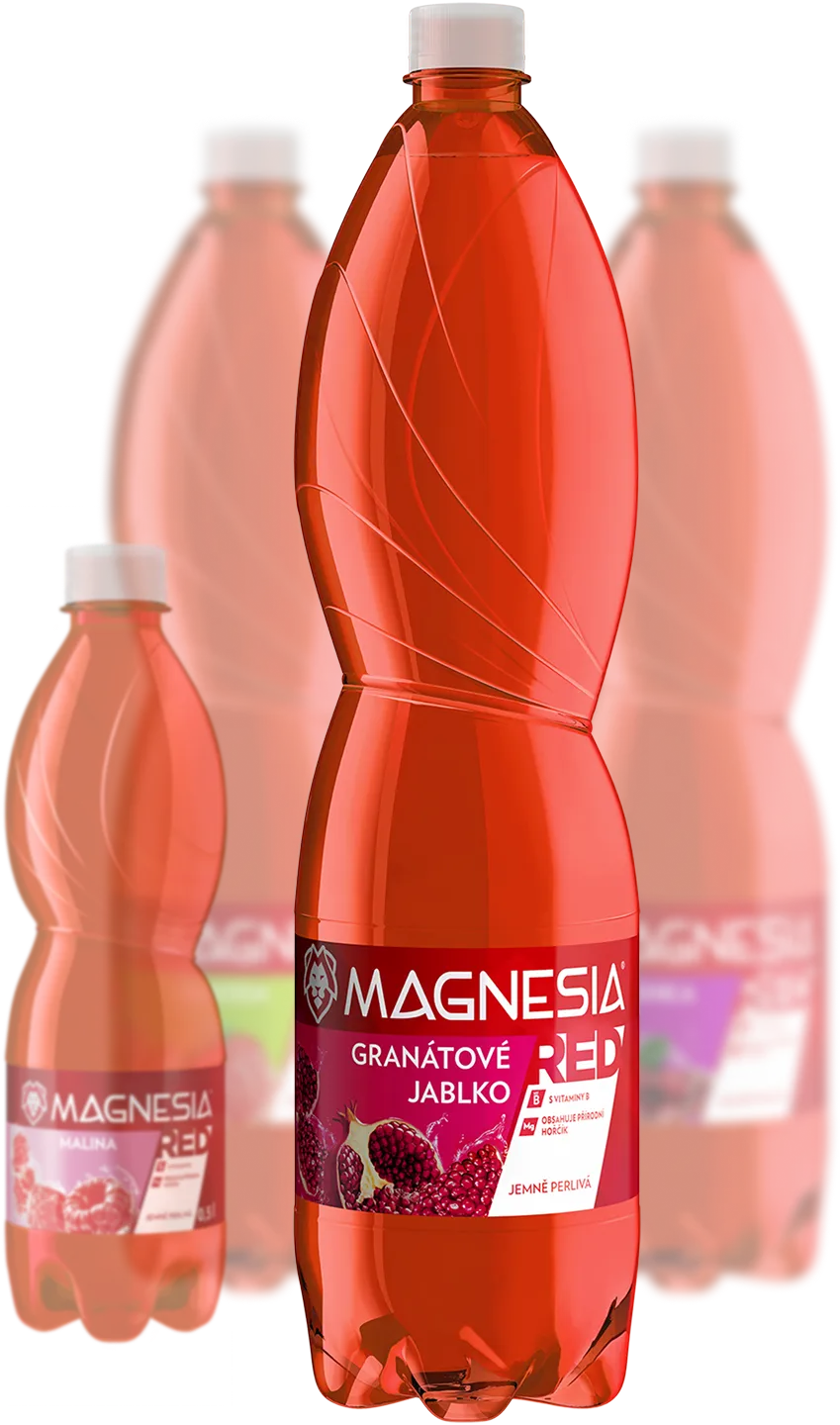Four red Magnesia mineral water bottles with white caps, featuring flavors including pomegranate apple and raspberry.