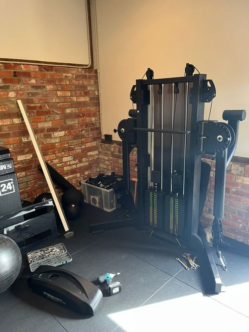 Gym equipment being moved by Lifted Moving crew in Dorset