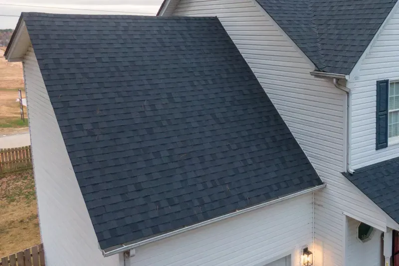 Dark architectural shingle roof on a two-story home