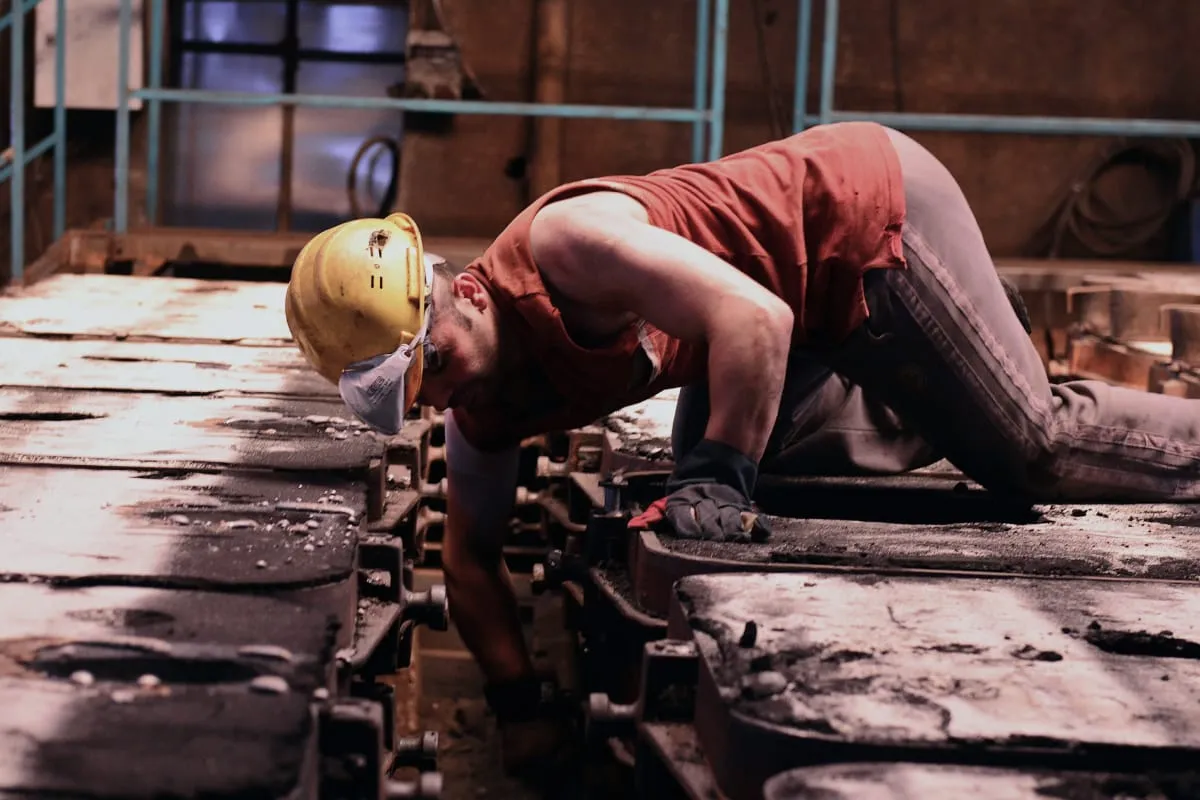Technician inspecting some machinery