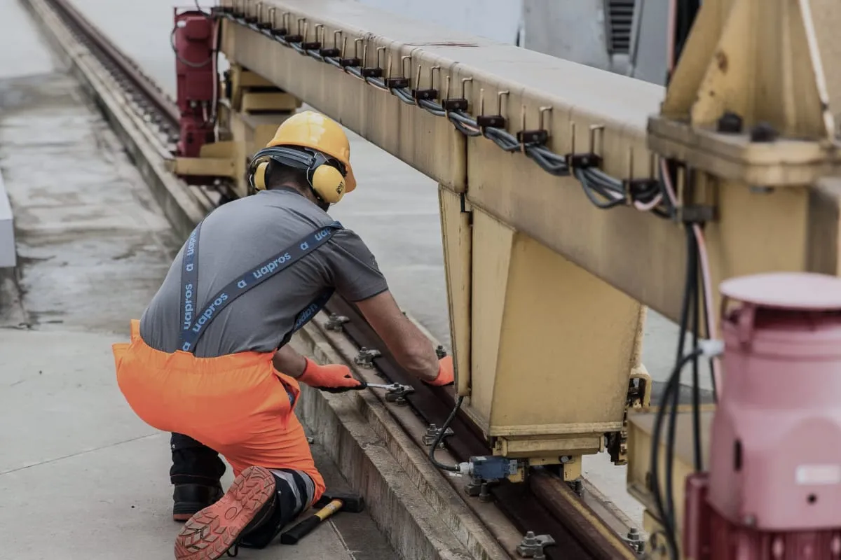 An external subcontractor repairing some rails