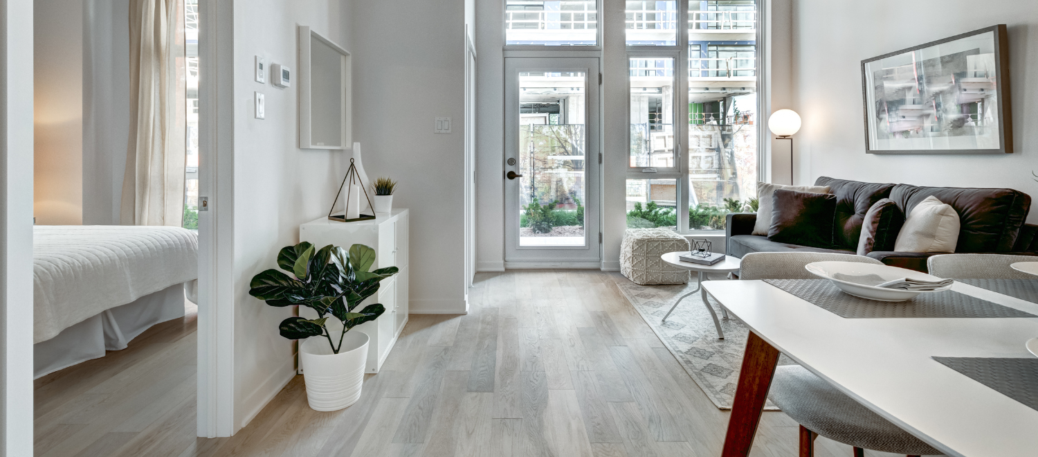 Beyond dynamic pricing dashboard showing reservation grid with nightly rates and availability across 12 short-term rental listings for April-May 2026