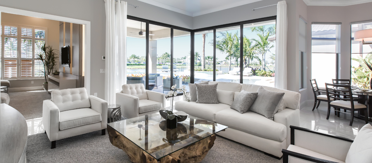 Beyond dynamic pricing dashboard showing reservation grid with nightly rates and availability across 12 short-term rental listings for April-May 2026