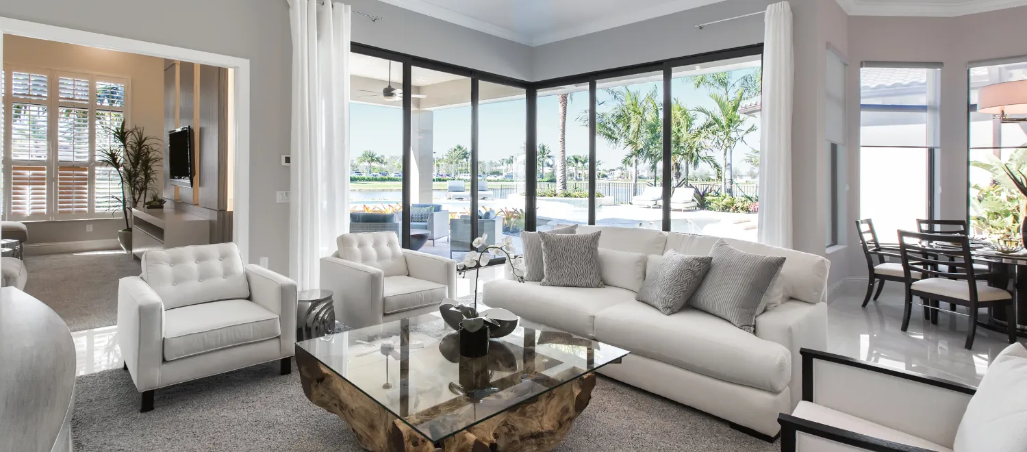 Beyond dynamic pricing dashboard showing reservation grid with nightly rates and availability across 12 short-term rental listings for April-May 2026