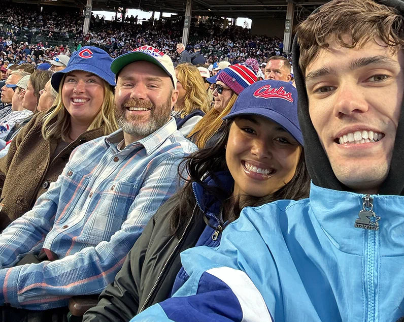 Beyond Team at a crowded baseball stadium, watching the Cubs.