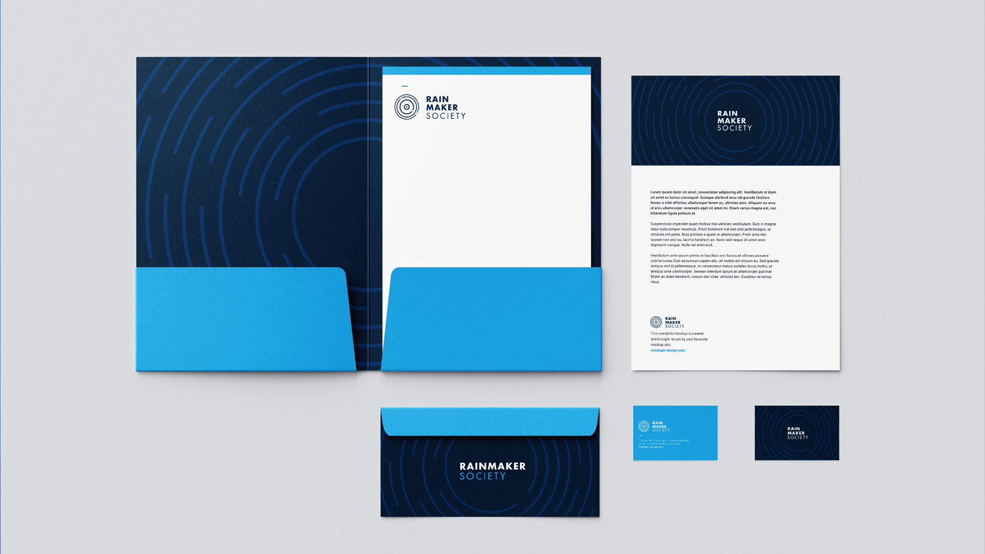 Rainmaker Society stationery set with folder, letterhead, envelope, and business cards