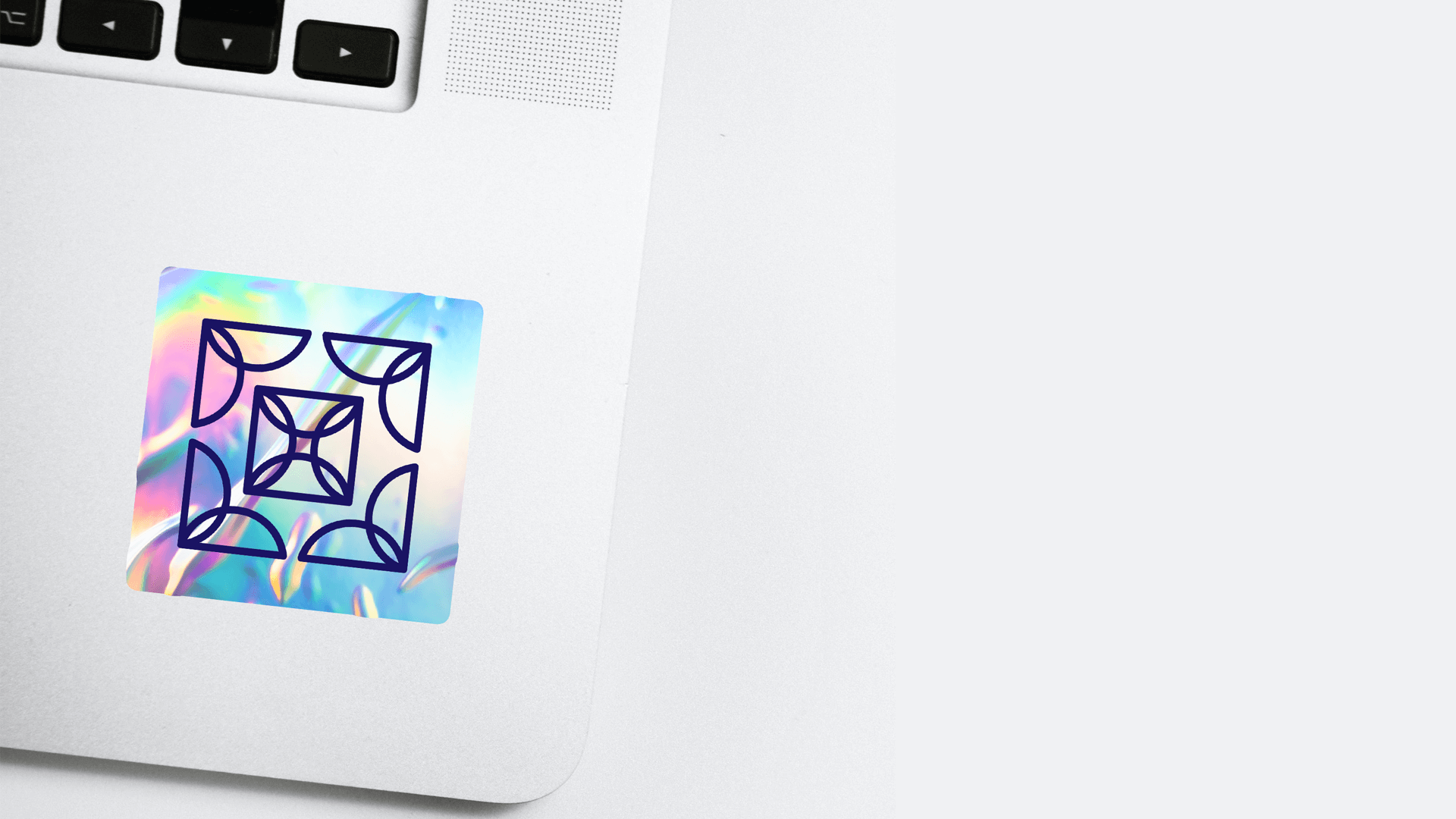 Holographic Lacewing Technologies sticker applied to a silver laptop