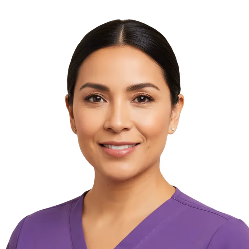 Smiling woman in purple medical scrubs with hair pulled back.