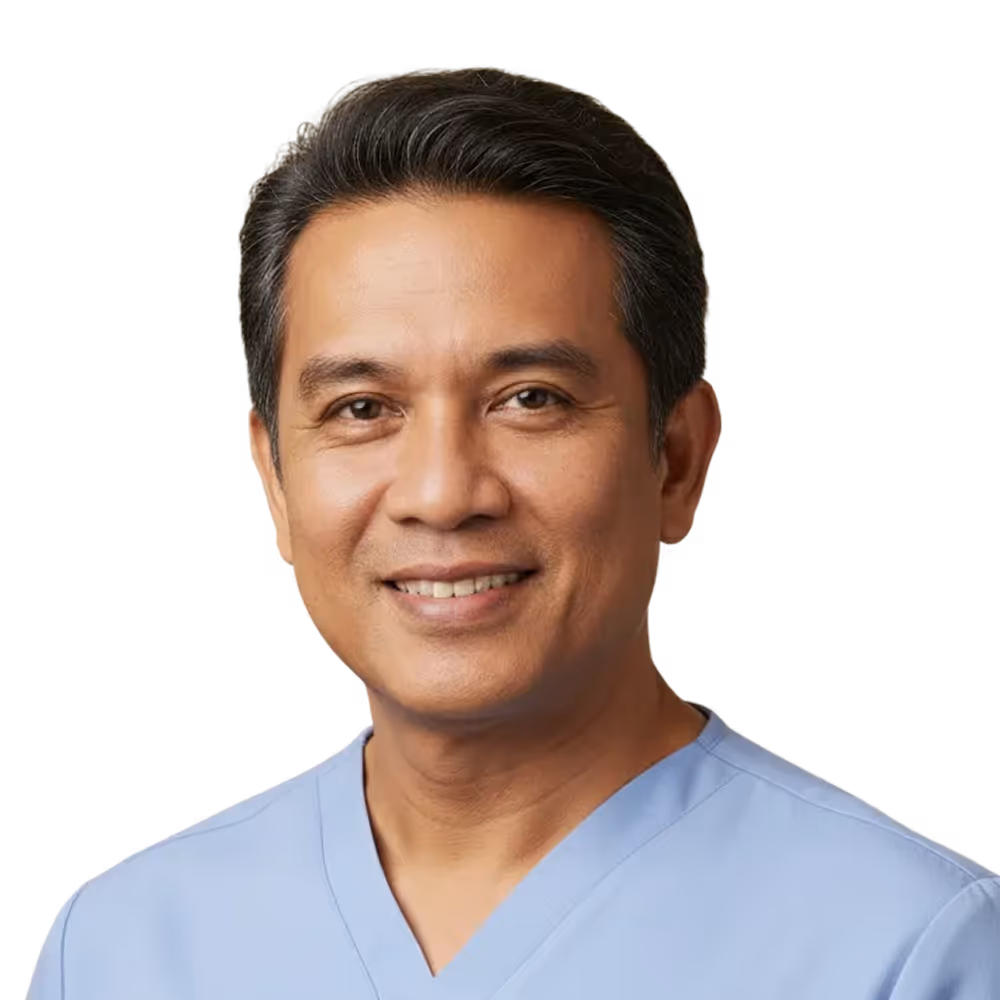 Smiling middle-aged man wearing light blue medical scrubs on a transparent background.