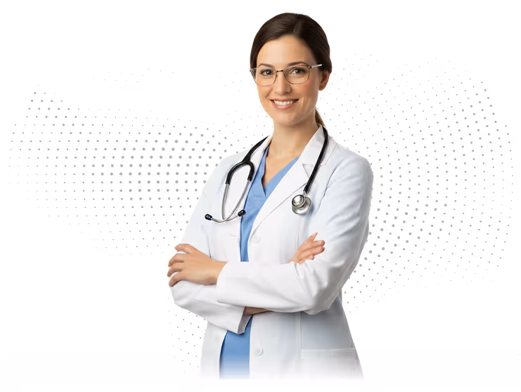Smiling female doctor with glasses and stethoscope wearing white lab coat and blue scrubs.
