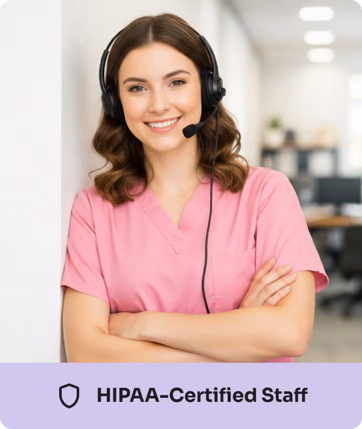 Smiling woman in pink scrubs wearing a headset, labeled HIPAA-Certified Staff.