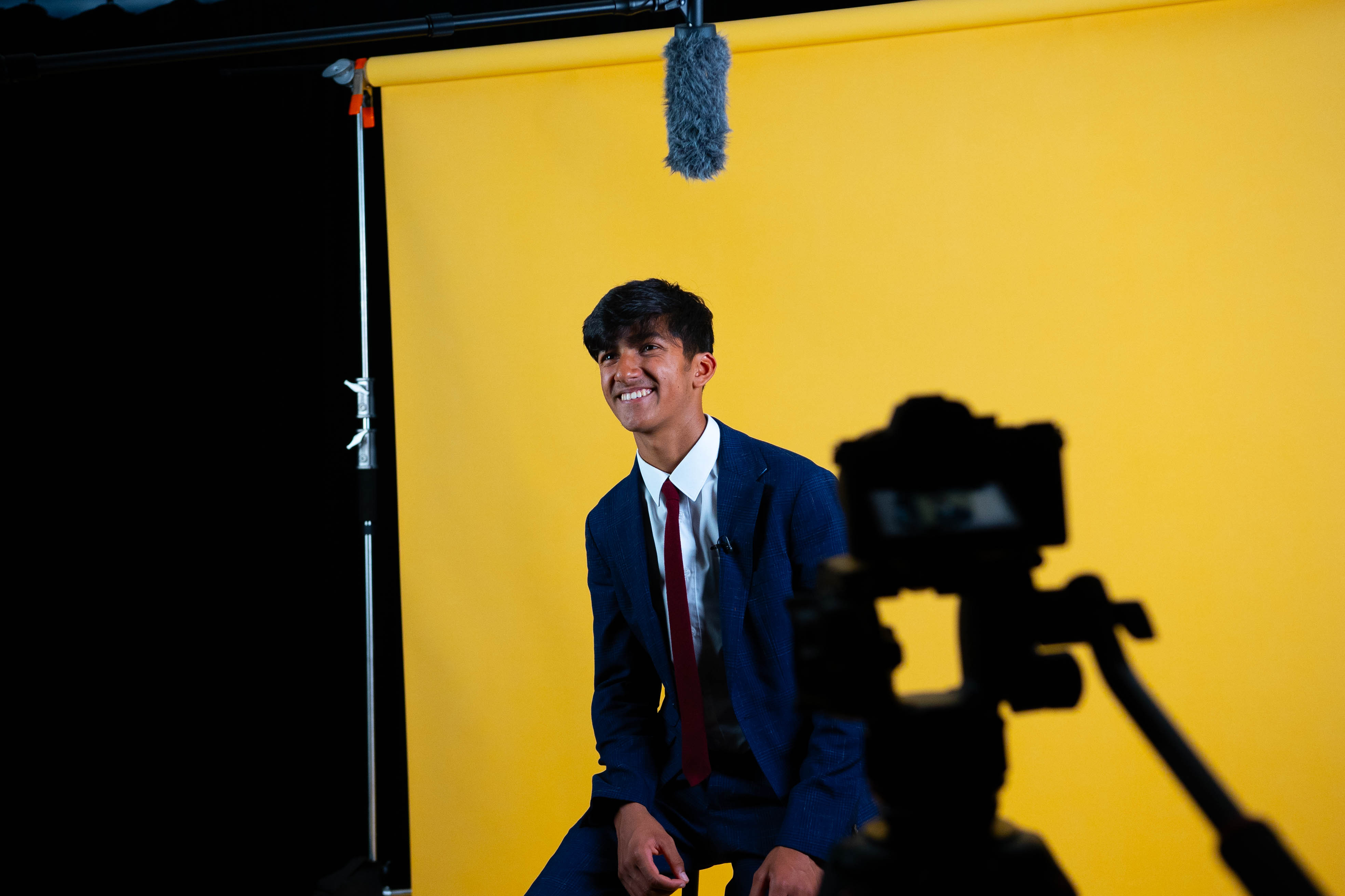 Pupil interview being filmed by Feel Good Films during a school video production.