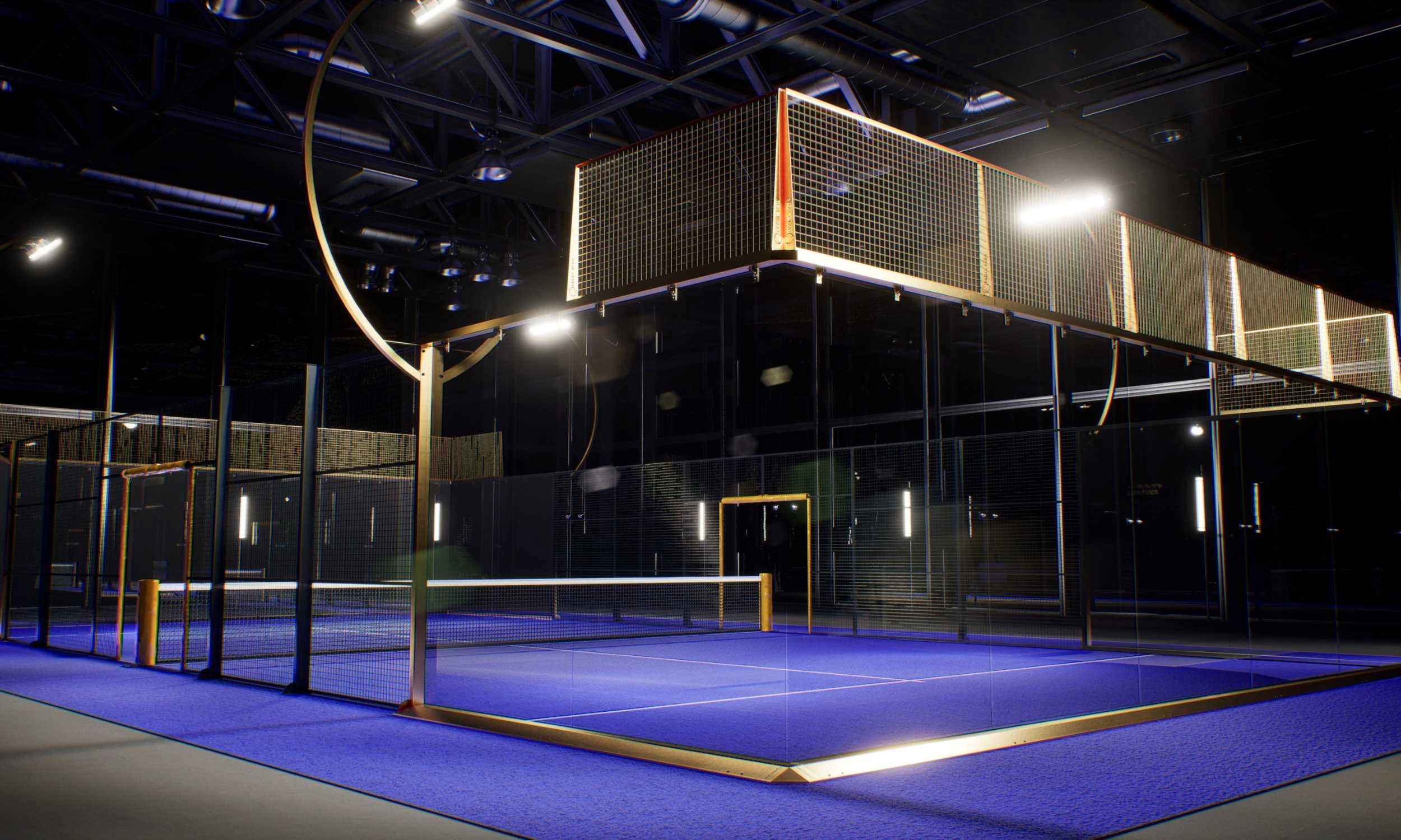 Indoor padel court with blue playing surface and glass walls under bright artificial lighting.
