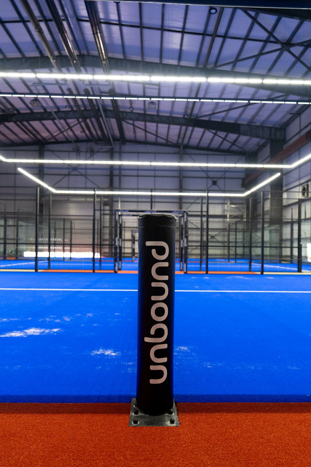 Unbound padel cafe and shop overlooking padel courts