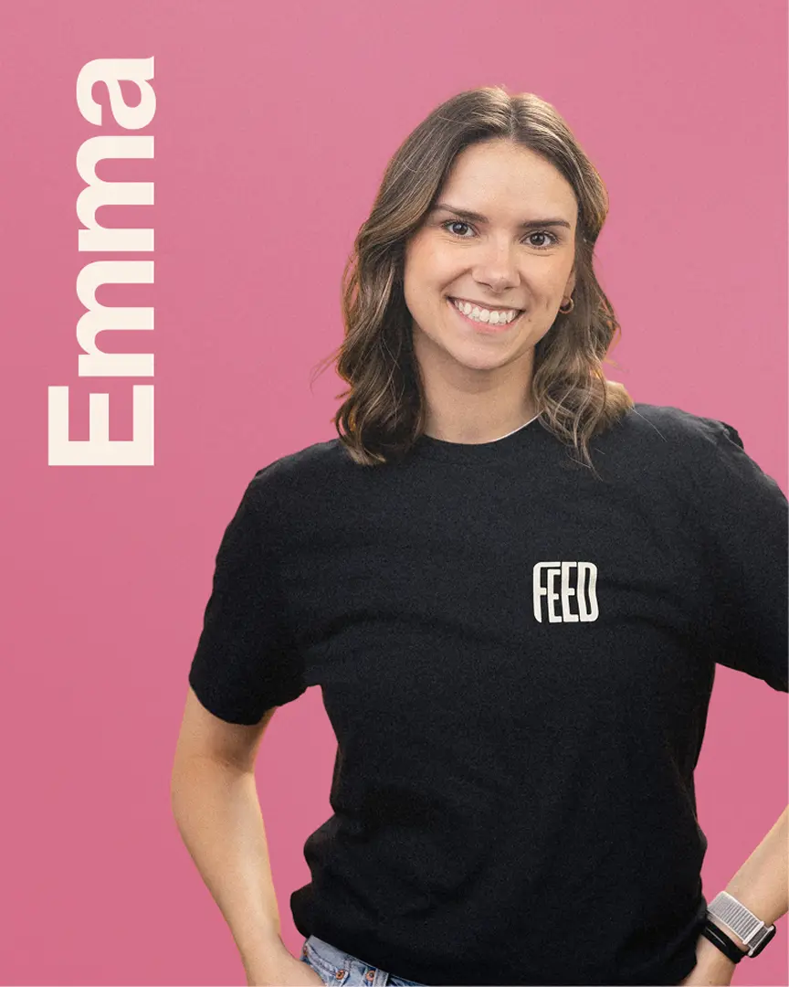 Emma wearing a black FEED t-shirt with the name Emma written vertically.