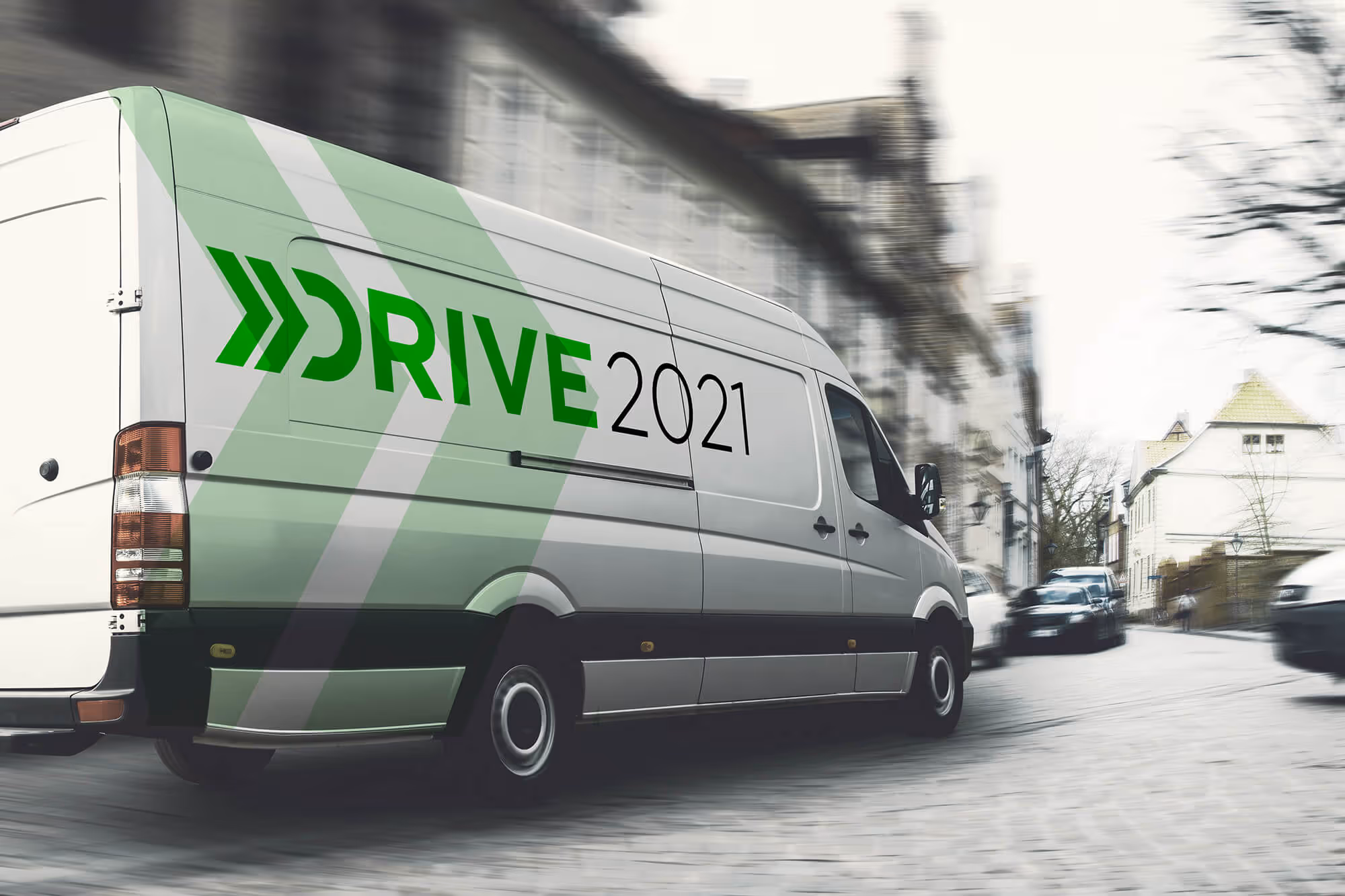 Photo of a fleet vehicle driving and the words DRIVE 2021 Industry Summit