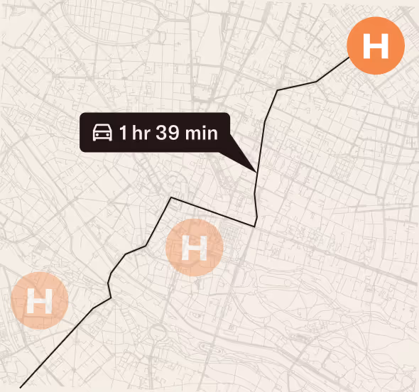 Map showing a driving route passing through three hospital locations marked with orange H icons with a travel time of 1 hour 39 minutes.