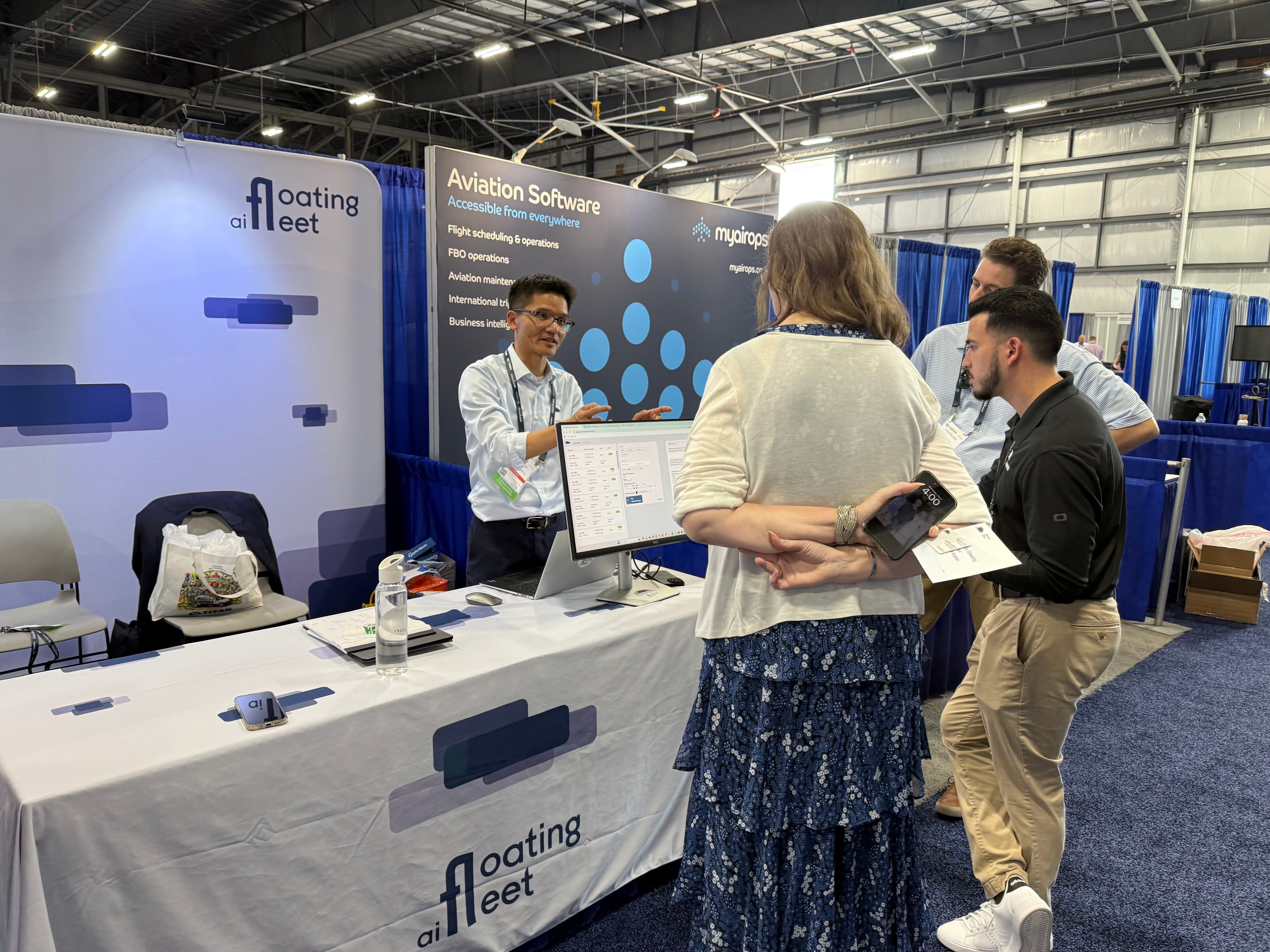 image of staff consulting a customer (for an automotive service)