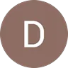 Brown circle with white letter D in the center.