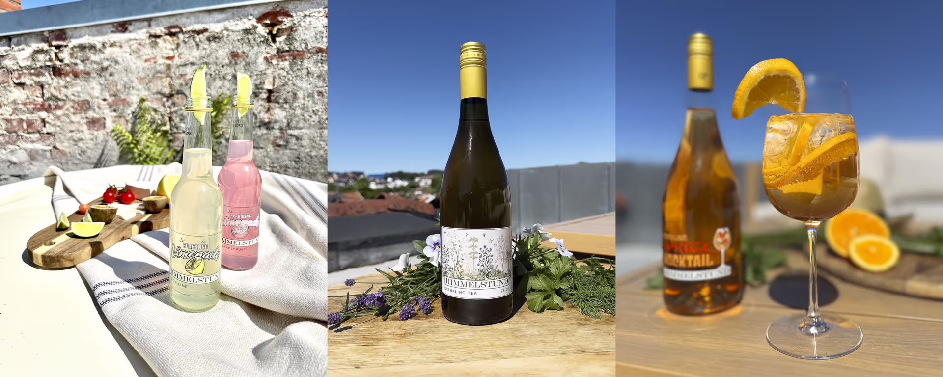 Tre ulike drikker: to flasker med sitron- og grapefruktsmak med sitronskiver på toppen, en flaske med kullsyre-te med blomster rundt, og en cocktail med appelsinskiver og isbit i et vinglass.