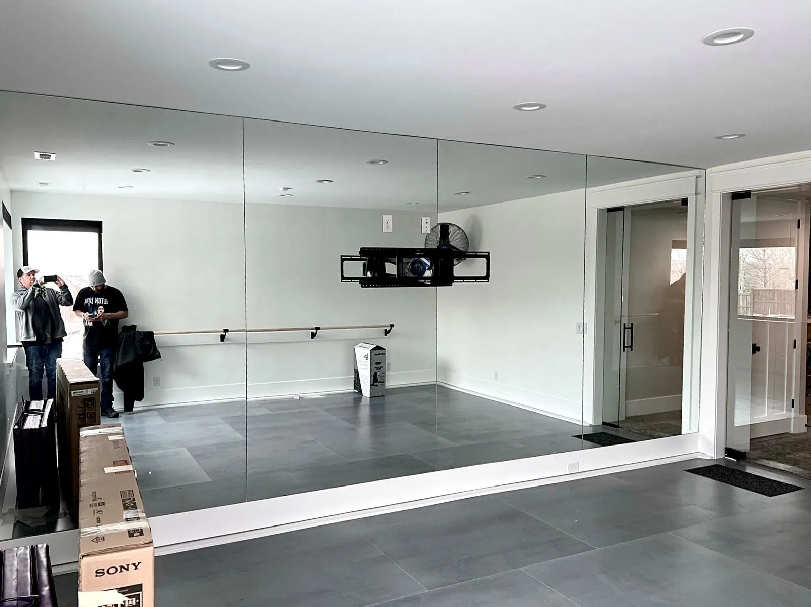 Gym mirror installation in Salt Lake City Utah — floor-to-ceiling custom glass for home fitness