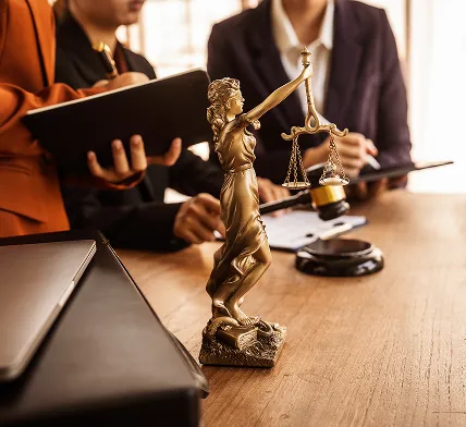 Scales of justice symbolize legal advocacy by South Florida Horsemen’s Group.