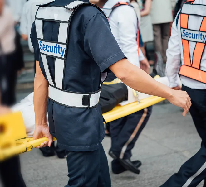 Emergency team carries stretcher representing aid from South Florida Horsemen’s Group.