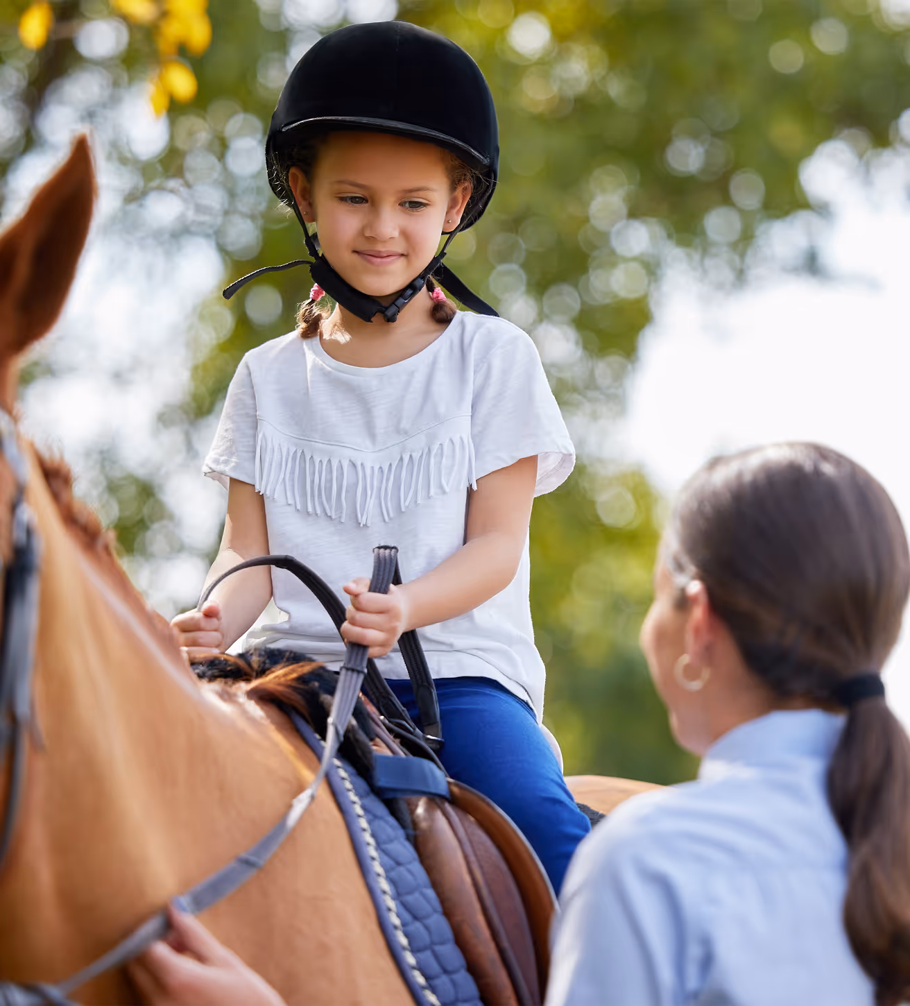 Young rider participates in lesson supported by South Florida Horsemen’s Group.