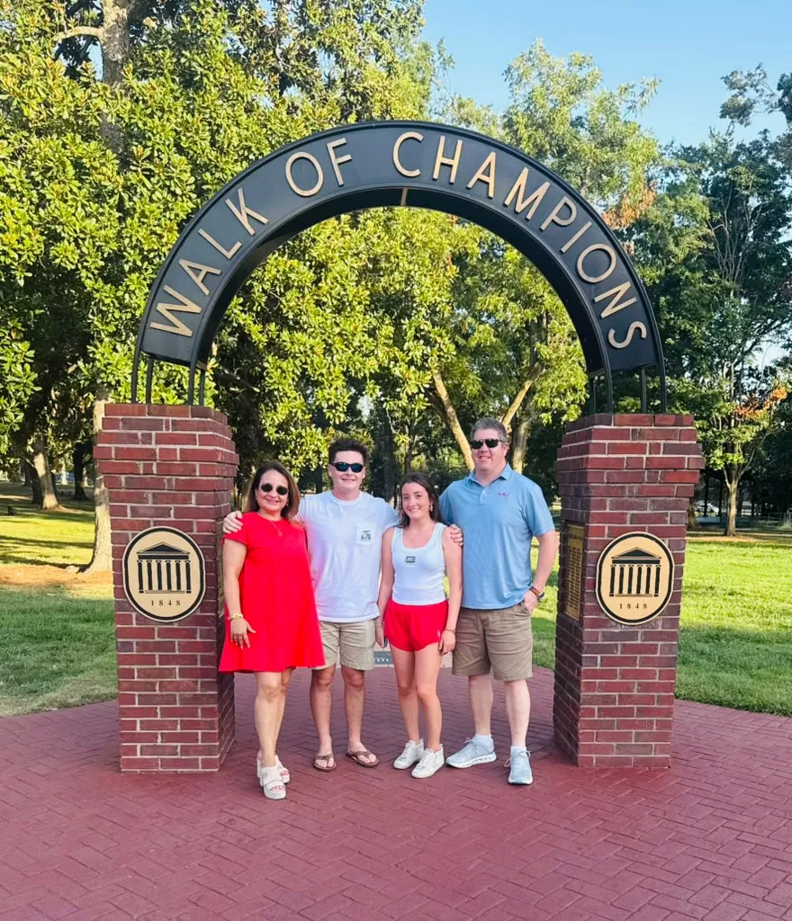 Student and family at the Walk of Champions, Ole Miss