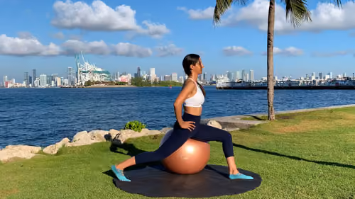 Hip flexor stretch on a stability ball to improve flexibility