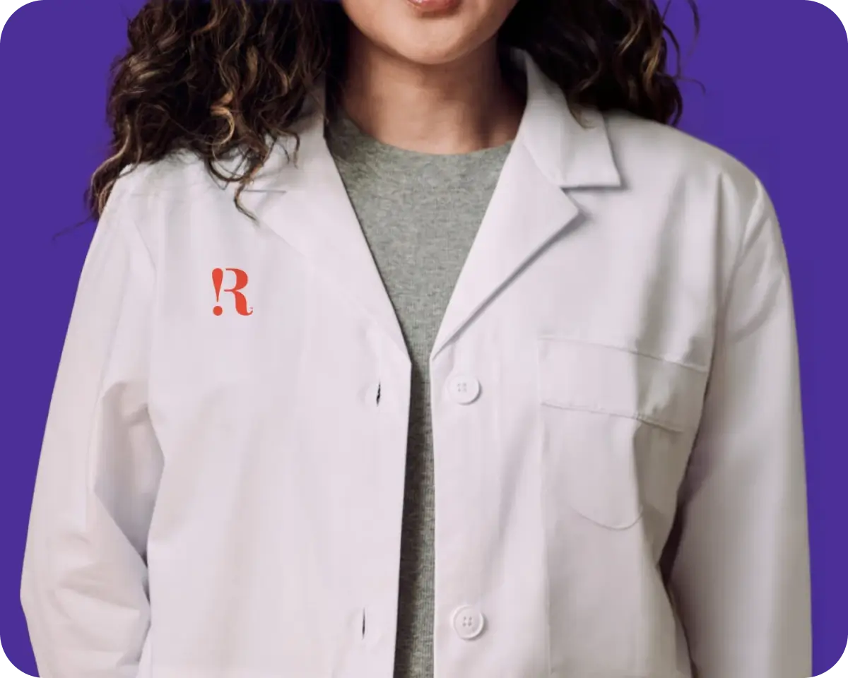 Healthcare professional in lab coat representing evidence-based menopause care