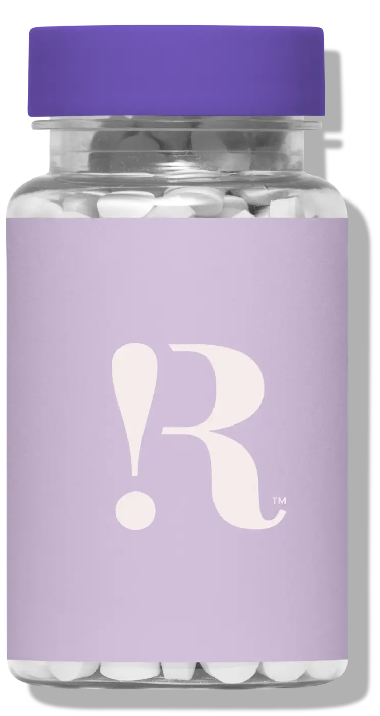 Clear pill bottle with a purple label featuring a stylized exclamation mark and letter R logo.