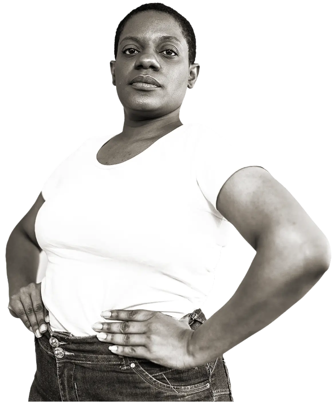 Confident woman wearing a white t-shirt and dark jeans, standing with hands on hips.