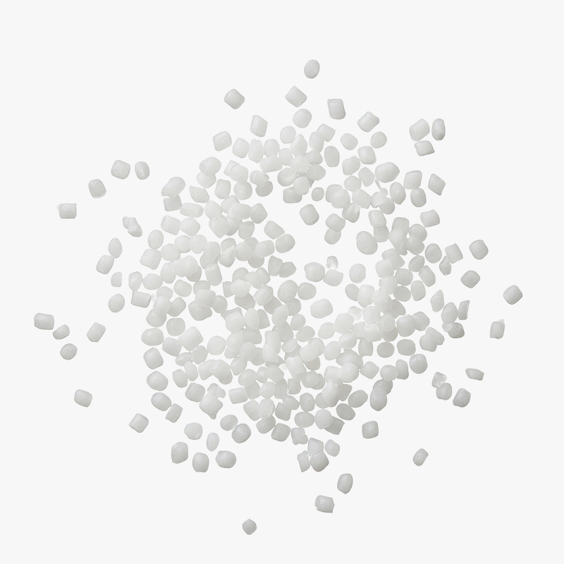 Pile of small white plastic pellets on a plain white background.