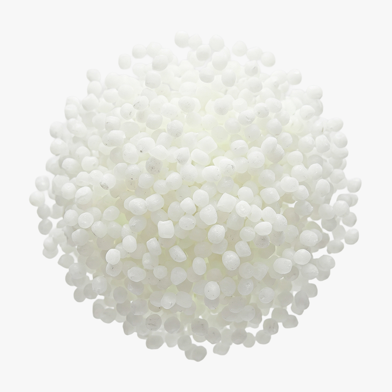 Cluster of small, irregular white plastic pellets on a white background.