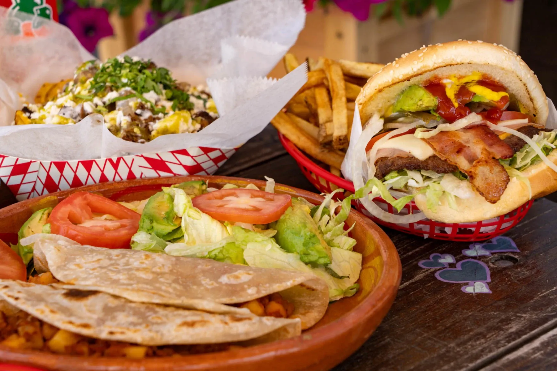 A plate of food with a burger and fries.