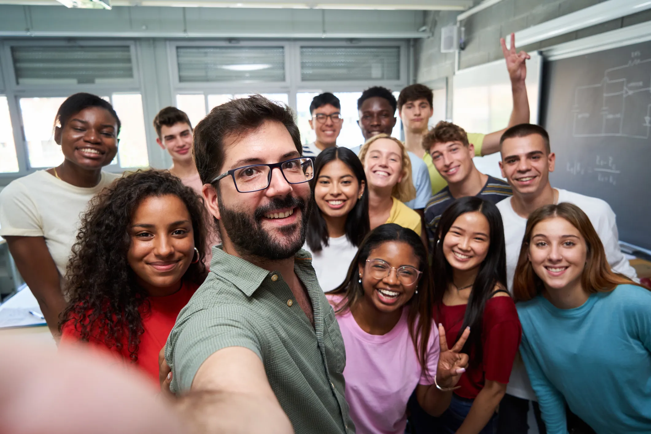 iStock 1422179083 High GroupSelfieInClassroom