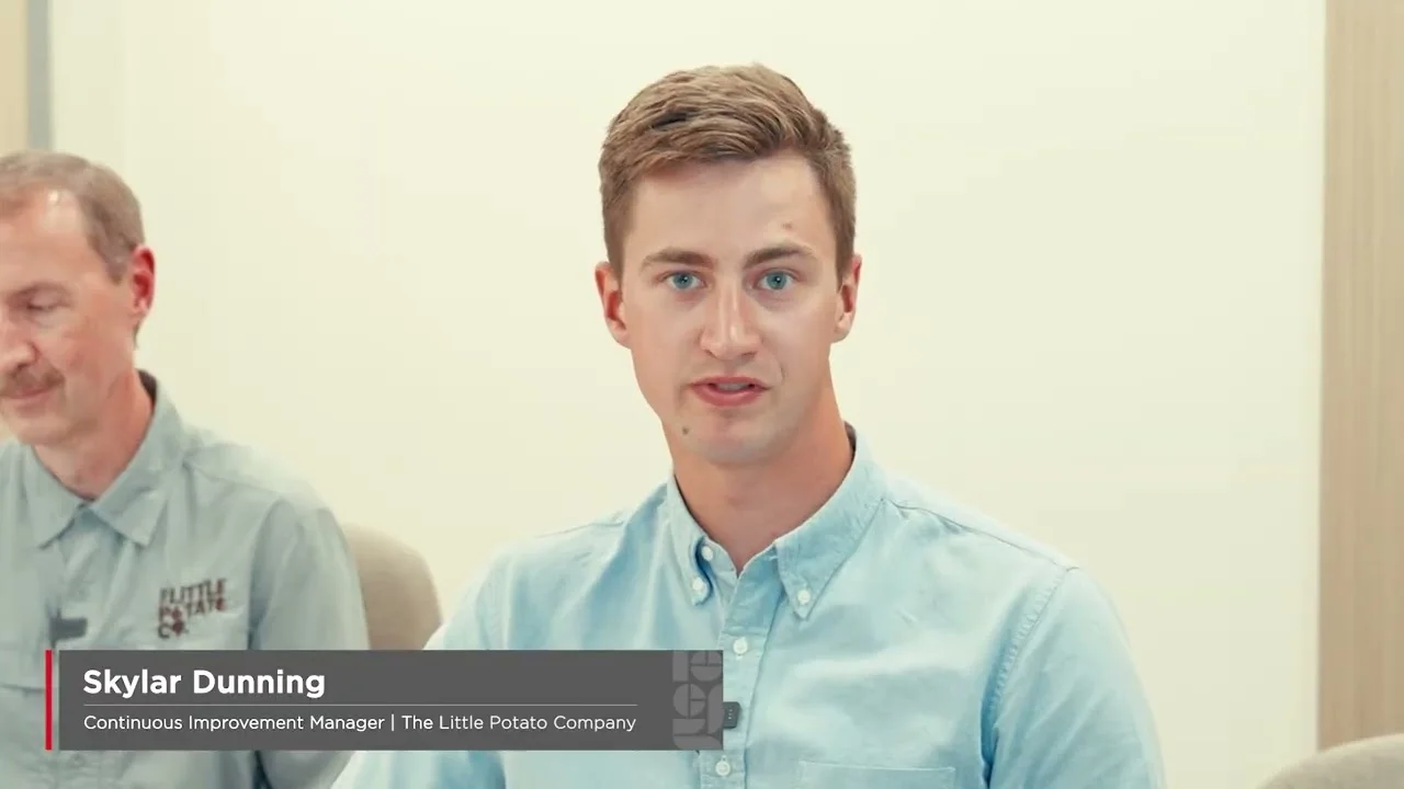 Man speaking in an interview setting with on-screen text identifying him as Skylar Dunning, Continuous Improvement Manager at The Little Potato Company.