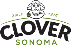 Logo with smiling cow holding a clover leaf, text reads Since 1916 CLOVER SONOMA.